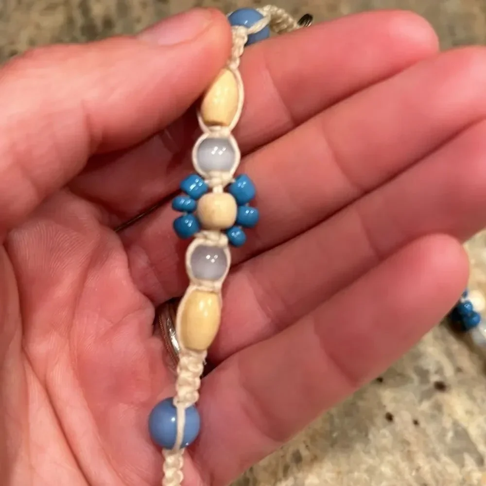 Kids beaded necklace with a silver turtle at the bottom of the necklace